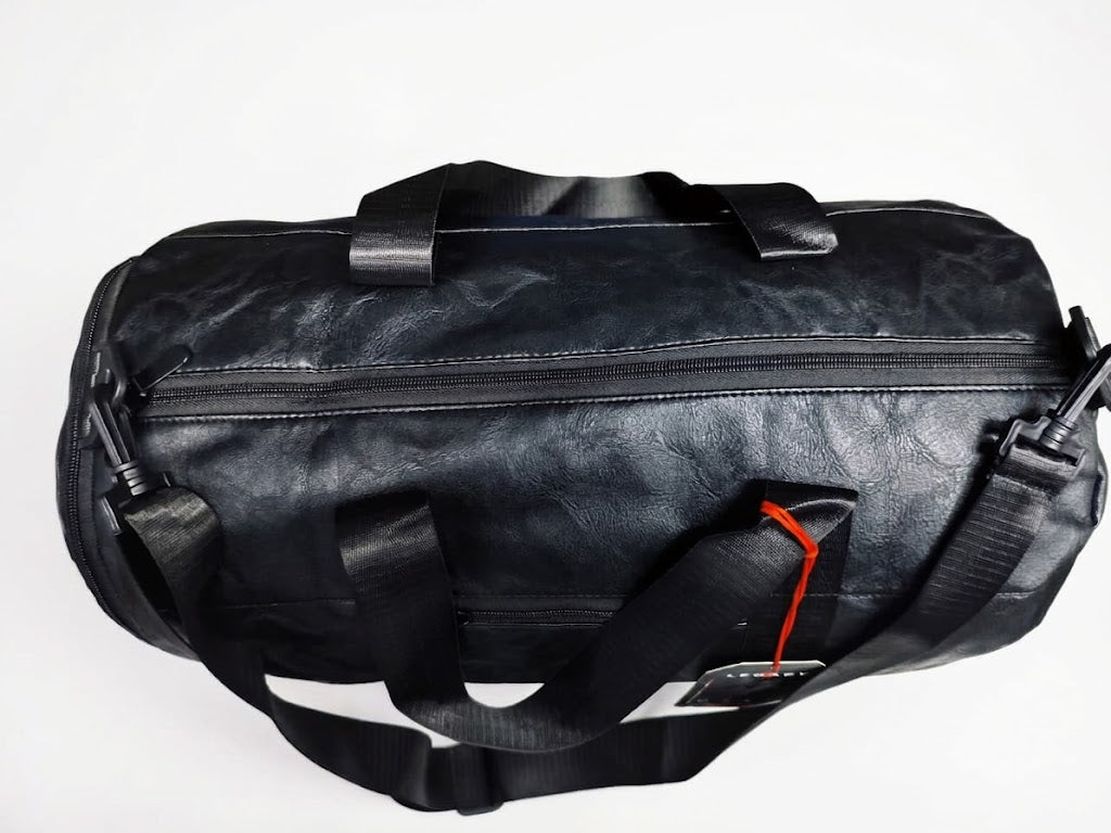 #LegacyBag #DuffelBag #LeatherDuffelBag #GymBag #TravelBag #MensFashion #TravelGear #LeatherBag #CarryOnBag #OvernightBag #StylishBag #LegacyBrand

Shop a stylish brown leather-look duffle bag for men. Featuring a spacious design, durable handles, zipper closure, and an adjustable shoulder strap, it's ideal for gym sessions, weekend trips, and everyday travel.

Brown Duffle Bag, Leather Travel Bag, Men's Travel Bag, Brown Gym Bag, Duffle Bag for Men, Weekend Travel Bag, Shoulder Strap Bag, Premium Travel 