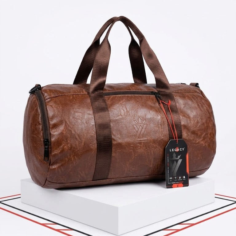 #LegacyBag #DuffelBag #LeatherDuffelBag #GymBag #TravelBag #MensFashion #TravelGear #LeatherBag #CarryOnBag #OvernightBag #StylishBag #LegacyBrand

Shop a stylish brown leather-look duffle bag for men. Featuring a spacious design, durable handles, zipper closure, and an adjustable shoulder strap, it's ideal for gym sessions, weekend trips, and everyday travel.

Brown Duffle Bag, Leather Travel Bag, Men's Travel Bag, Brown Gym Bag, Duffle Bag for Men, Weekend Travel Bag, Shoulder Strap Bag, Premium Travel 