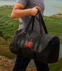 Person holding a black Jordan duffel bag with a scenic background

Lightweight, ergonomic, and business-friendly packs from brands like Arctic Hunter offer dedicated laptop and shoe compartments

durable duffle bags in Bangladesh at Patchee BD. Perfect for the gym, travel & weekend trips