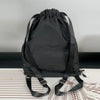 Black drawstring backpack on a textured surface with a neutral background

Backpack, Gym Bag, Drawstring Bag, Sports Gear

Stay organized during workouts, football practice and everyday activities with this versatile sports drawstring backpack. Designed with a spacious main compartment, convenient side mesh pockets and a separate lower compartment for shoes, it helps keep your sports essentials organized.