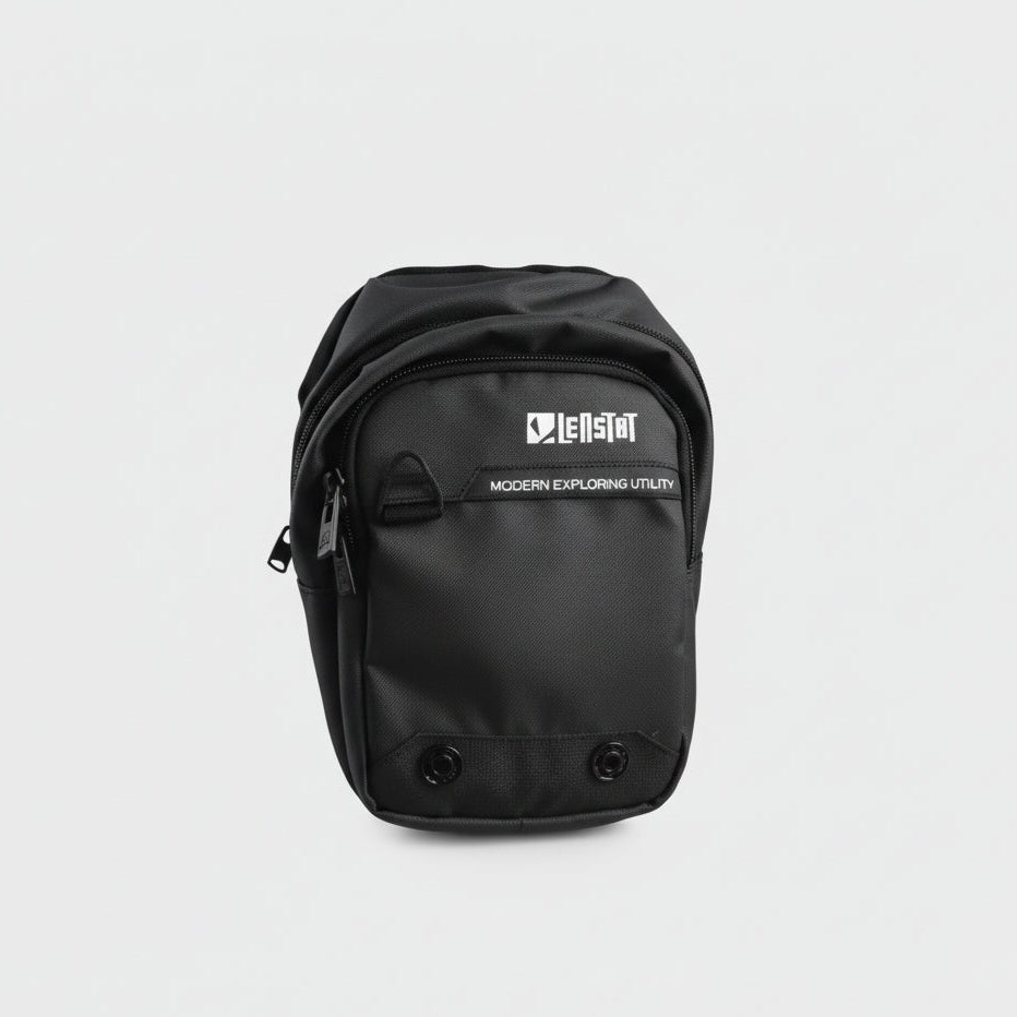 Person wearing a black tactical pouch on a white background