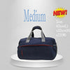 Navy blue duffel bag with gray handles on a white platform, labeled 'Medium' and 'NEW!' with dimensions.