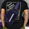 Person wearing a black t-shirt with 'NAVI FORCE' text and a navy blue bag.